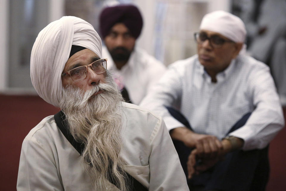 ***HOLD FOR RELIGION TEAM STORY*** Mohinder Singh listens to a sermon and is shown at the Shri Guru Ravidass Sabha ceremony at a temple in Fresno, Calif. Sunday, May 7, 2023. Members of the Ravidassia community in California are followers of Guru Ravidass, a 14th century Indian guru of a caste formerly considered untouchable. The Ravidassia community statewide is advocating for new legislation to outlaw caste-based discrimination. (AP Photo/Gary Kazanjian)