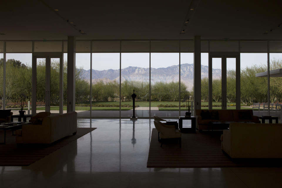 The view from inside the Sunnylands Center & Gardens at The Annenberg Retreat at Sunnylands, Rancho Mirage, Calif., where President Barack Obama is playing golf according to White House officials, on Saturday, Feb. 15, 2014. With two stays in less than a year at the sprawling Sunnylands estate in Southern California, President Barack Obama is helping to fulfill the dream of the late philanthropists Walter and Leonore Annenberg, who hoped the property they used as a winter home would become the “Camp David of the West.” (AP Photo/Jacquelyn Martin)