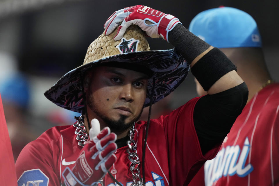 Miami Marlins' Luis Arraez gestures after hitting a two-run home run during the first inning of a baseball game against the New York Yankees, Saturday, Aug. 12, 2023, in Miami. (AP Photo/Marta Lavandier)