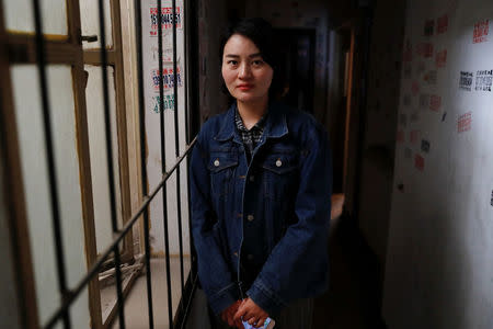 Li Wenzu, wife of detained Chinese rights lawyer Wang Quanzhang, poses for a picture in Beijing, April 12, 2018. REUTERS/Damir Sagolj