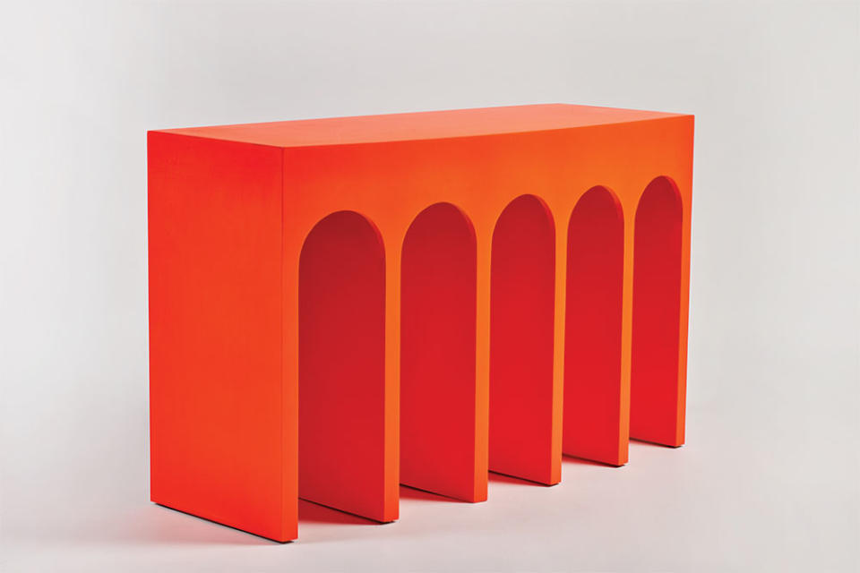 Martin and Brockett’s Arcade Console (,000), in ember lacquer, was inspired by Roman aqueducts. - Credit: Courtesy of DAN ARNOLD
