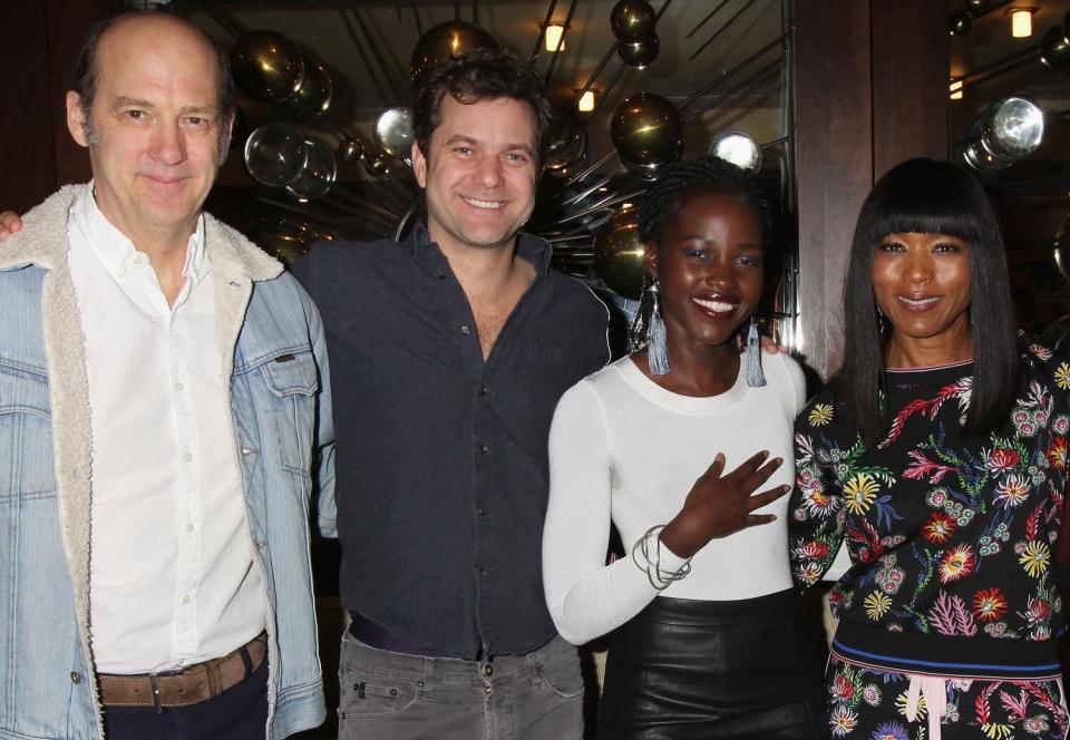 Anthony Edwards, Joshua Jackson, Lupita Nyong'o and Angela Bassett pose together and are embracing and smiling