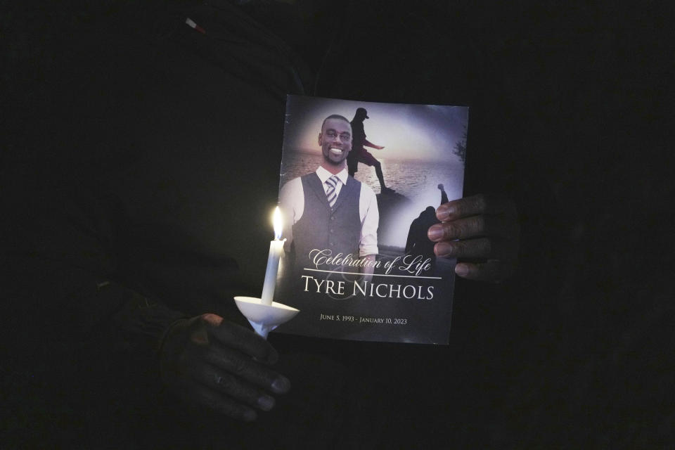 A crowd gathers to remember Tyre Nicholas during a candlelight vigil on the anniversary of his death Sunday, Jan. 7, 2024, in Memphis, Tenn. Nichols lost his life following a violent beating by five Memphis Police officers in January 2023. (AP Photo/Karen Pulfer Focht)