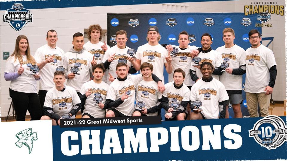 The Ashland University wrestling team poses for a picture after winning the Great Midwest Athletic Conference championship Saturday at Lake Erie College.