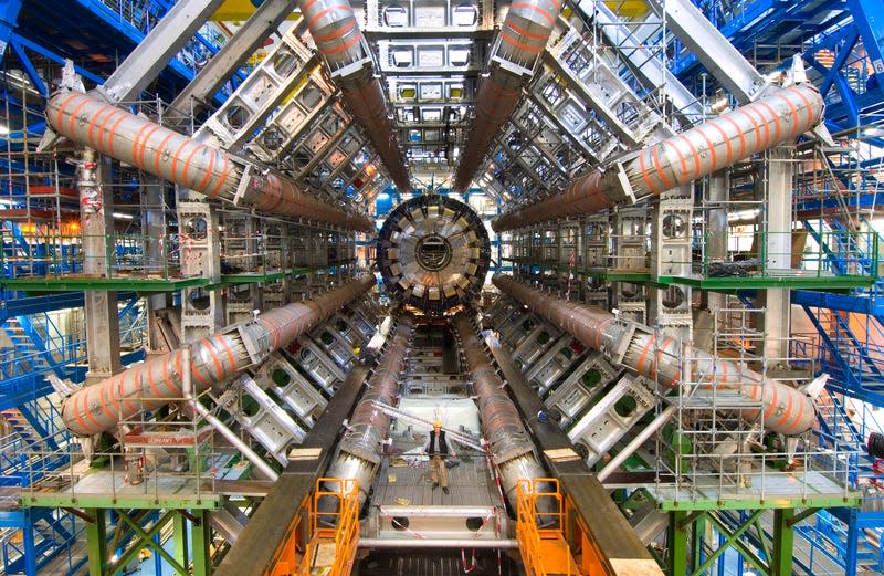 Eight toroid magenets in the ATLAS experiment (human at center for scale.)