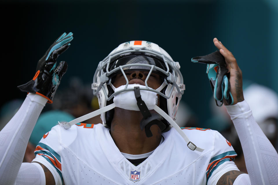 Miami Dolphins cornerback Jalen Ramsey (5) gestures as he enters the field for an NFL football game against the New England Patriots, Sunday, Oct. 29, 2023, in Miami Gardens, Fla. (AP Photo/Wilfredo Lee)