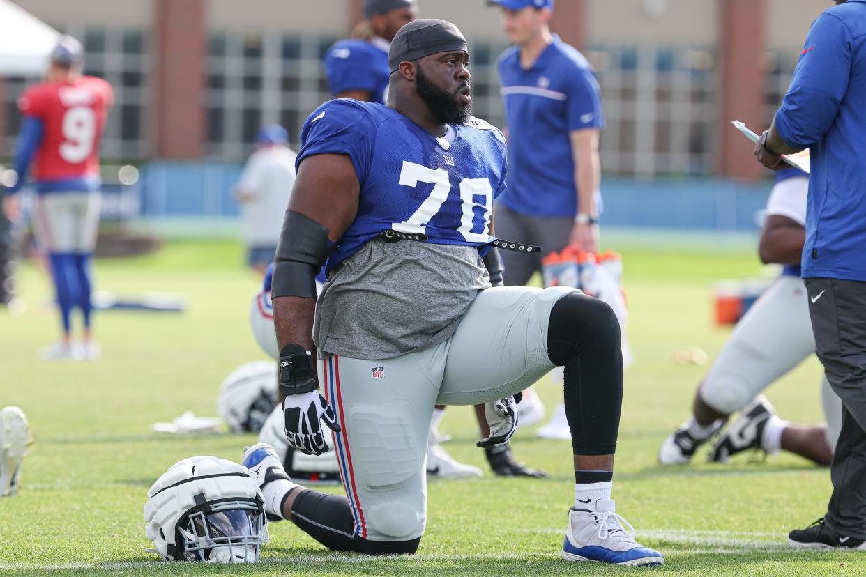 Aug 1, 2023; East Rutherford, NJ, USA; New York Giants offensive tackle Korey Cunningham (70) stretches during training camp at the Quest Diagnostics Training Facility. Mandatory Credit: Vincent Carchietta-USA TODAY Sports