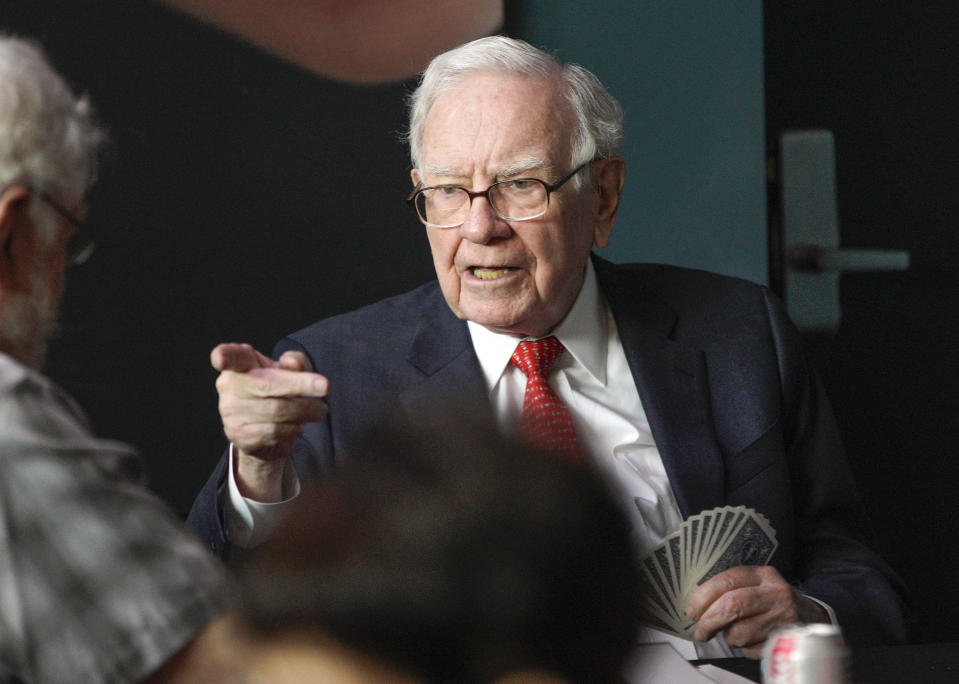 Warren Buffett, chairman and CEO of Berkshire Hathaway, gestures as he plays bridge outside Berkshire-owned Borsheims jewelry store in Omaha, Neb., Sunday, May 6, 2018. On Saturday, tens of thousands of Berkshire Hathaway shareholders attended the annual Berkshire Hathaway shareholders meeting. (AP Photo/Nati Harnik)