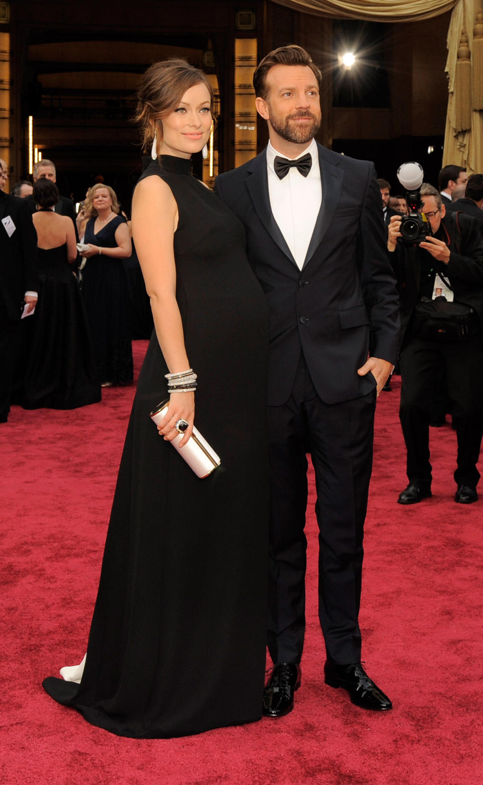 Olivia Wilde y Jason Sudeikis llegan a los Oscar el domingo 2 de marzo de 2014 en el Teatro Dolby en Los Angeles. (Foto Jordan Strauss/Invision/AP)