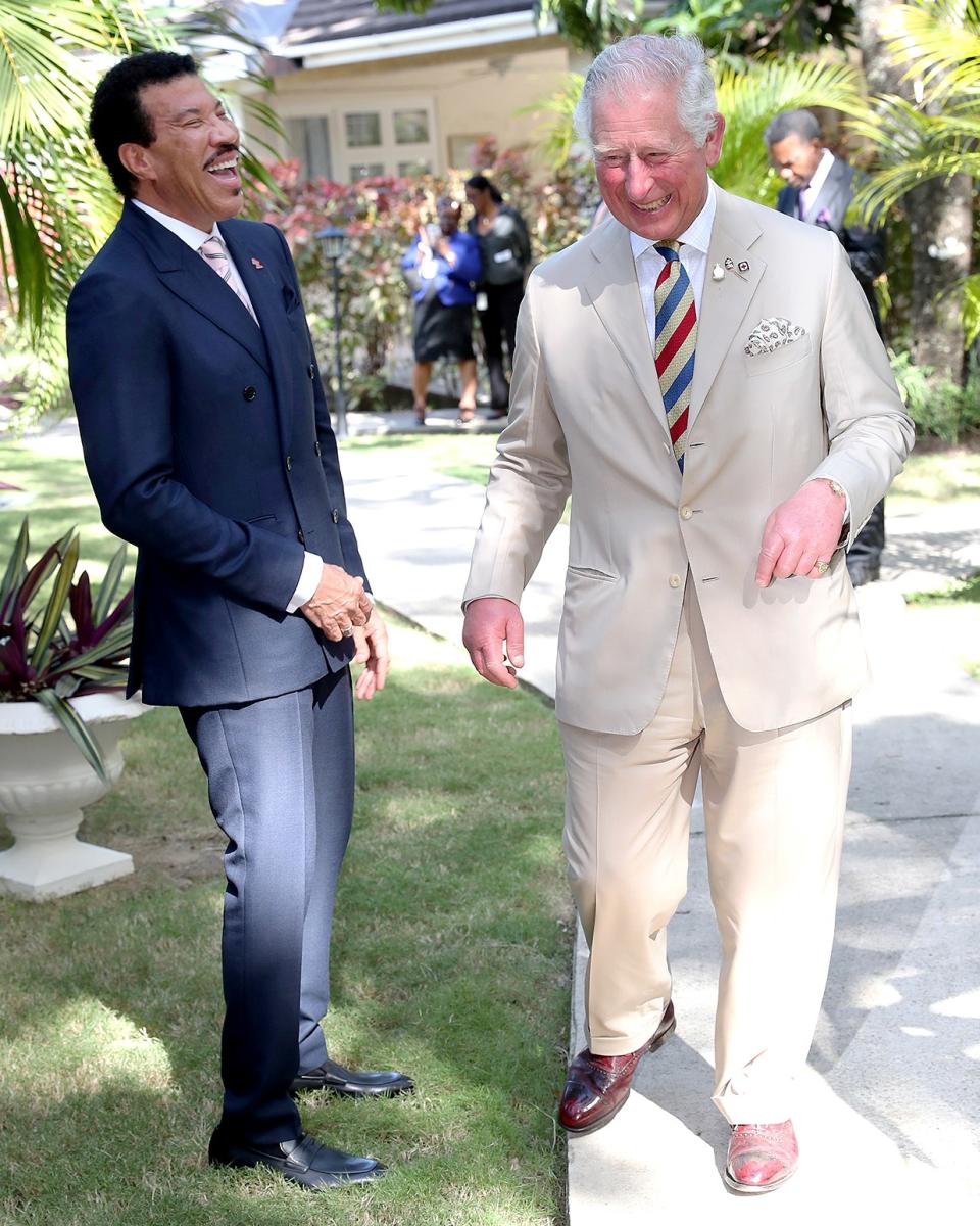 Lionel Richie and Prince Charles, just two well-dressed fellas having a ball.