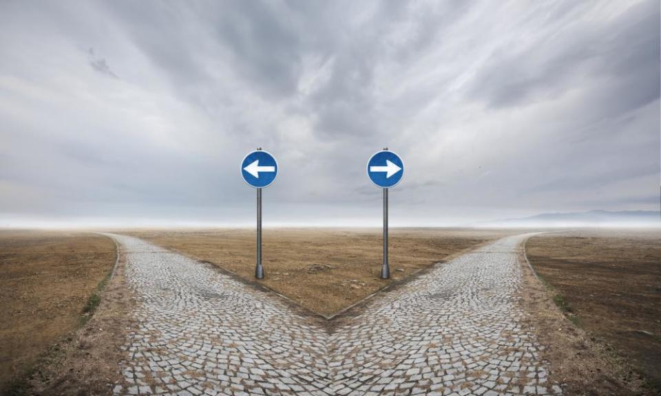 Road sign direction on desert