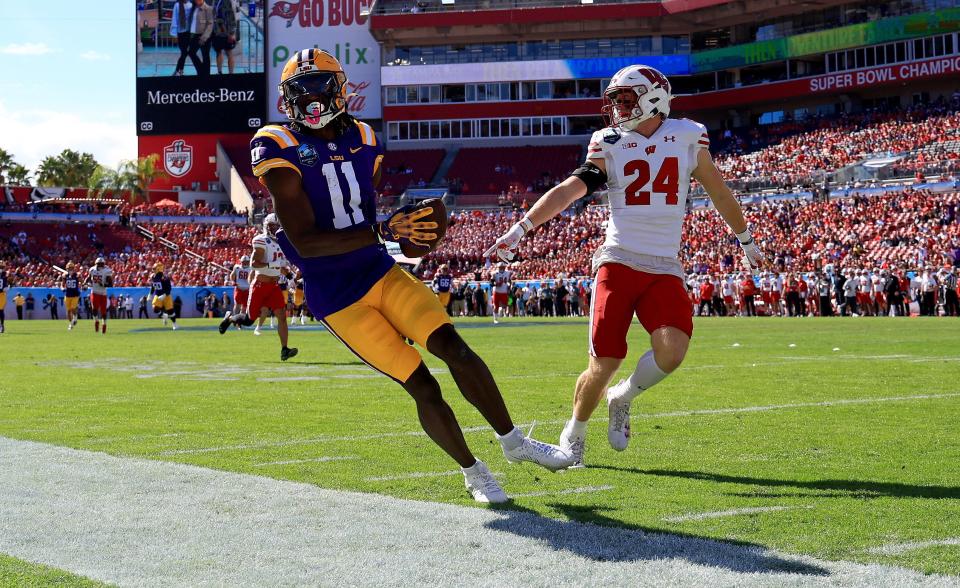 LSU wide receiver Brian Thomas makes a catch during the 2024 ReliaQuest Bowl in Tampa.