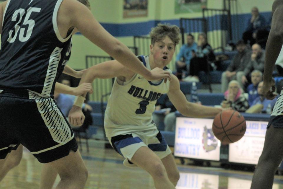 Senior guard Connor Wallace (3) scored a team-high 25 points for the Inland Lakes boys, who captured a road win at Central Lake on Thursday.