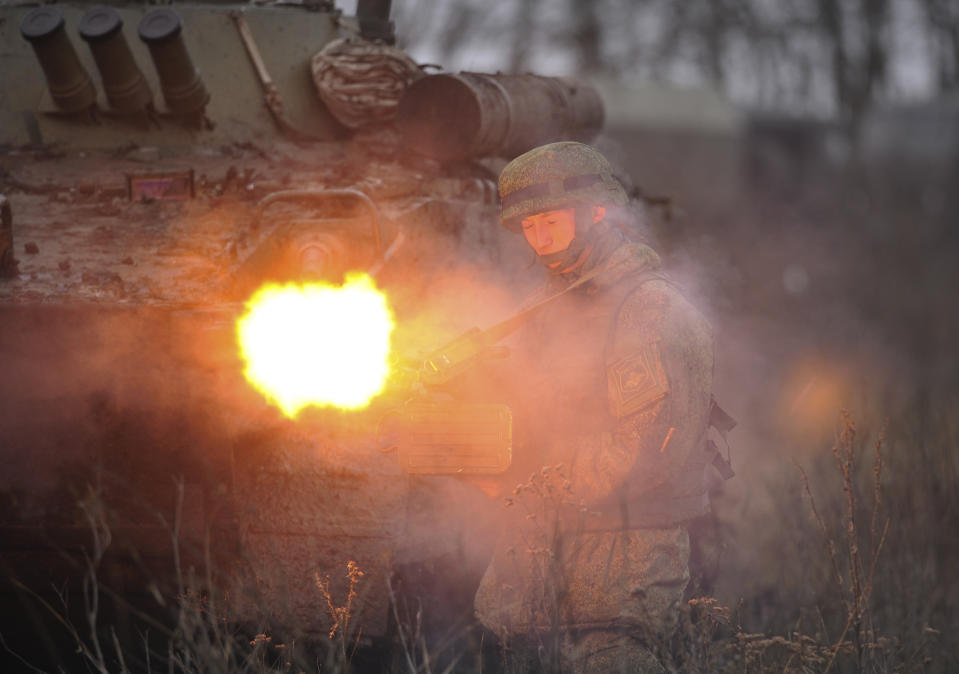 FILE - A Russian army soldier takes part in drills at the Kadamovskiy firing range in the Rostov region in southern Russia, Friday, Dec. 10, 2021. With tens of thousands of Russian troops positioned near Ukraine, the Kremlin has kept the U.S. and its allies guessing about its next moves in the worst Russia-West security crisis since the Cold War. (AP Photo, File)