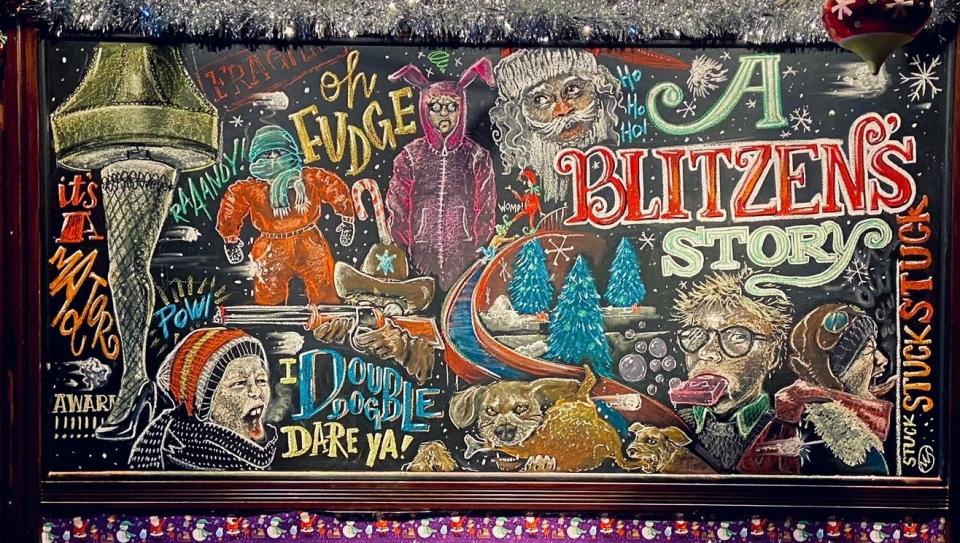 Artist Merry Shay's chalk drawing, inspired by "A Christmas Story," is at Blitzen's pop-up holiday bar inside Hudson's Restaurant, located at 80 N. Main St.