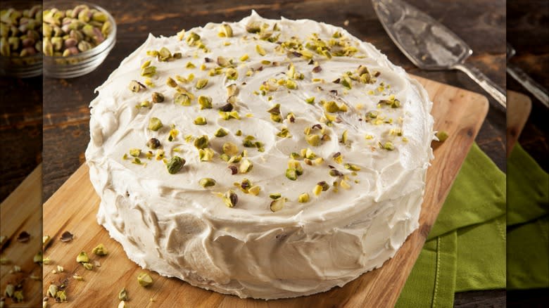 Watergate cake topped with pistachios