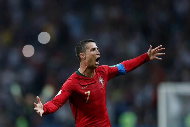 Portugal's Cristiano Ronaldo celebrates his World Cup hat-trick against Spain