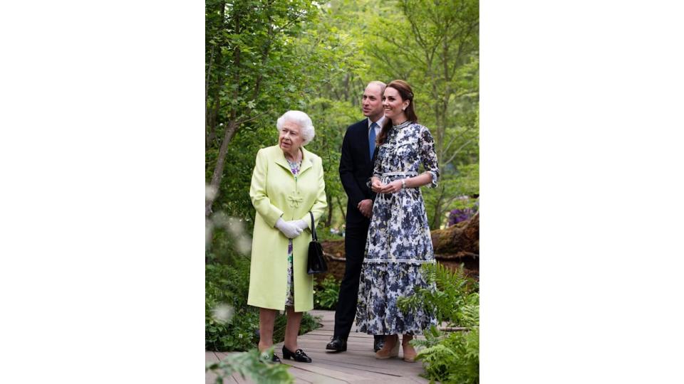 Kate showing the late Queen Elizabeth II around her Back to Nature garden in 2019