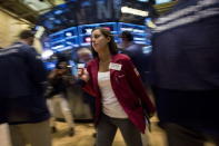 Traders work on the floor of the New York Stock Exchange August 24, 2015. REUTERS/Brendan McDermid