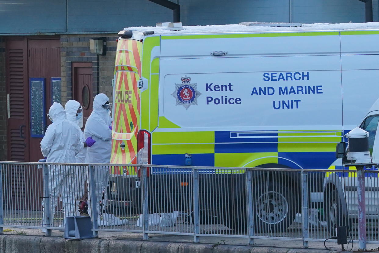 Police Forensic officers at the RNLI station at the Port of Dover after a large search and rescue operation launched in the Channel off the coast of Dungeness, in Kent, following an incident involving a small boat likely to have been carrying migrants. Three people have died following the incident and 43 people have been rescued, a Government source said. Picture date: Wednesday December 14, 2022. (Photo by Gareth Fuller/PA Images via Getty Images)