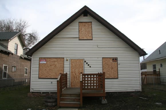 Boarded up house