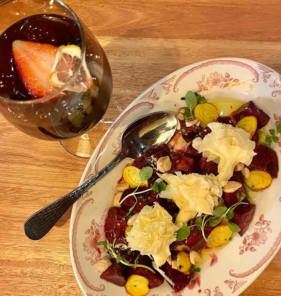 Roasted beets and sangria at Harvey's restaurant in Louisville.