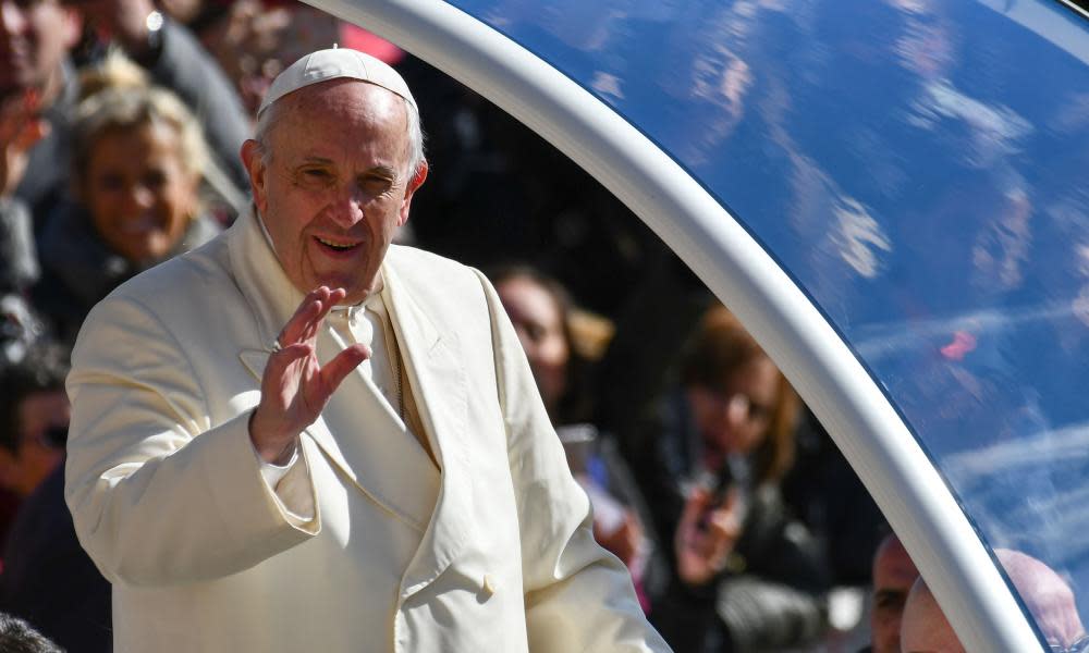 Pope Francis waves to the faithful in St Peter’s Square