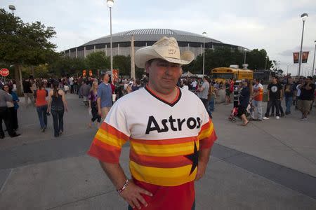 Joe Harris, 40, poses for a photo as people celebrate the 50th anniversary of the Astrodome stadium in Houston, Texas, April 9, 2015. REUTERS/Daniel Kramer