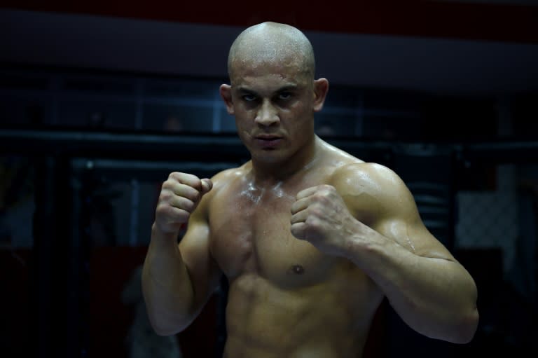 Afghan mixed martial arts (MMA) fighter Baz Mohammad Mubariz, a Tajik, trains ahead of a bout with longtime rival Ahmad Wali Hotak, a Pashtun, in a contest that has become a lightning rod for ethnic rivalries that threaten to tear the country apart