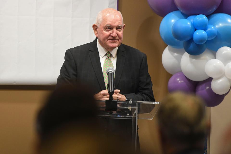 Chancellor Sonny Perdue speaks during the Wellstar and Augusta University Health System merger signing ceremony at Augusta University on Wednesday, Aug. 30, 2023.