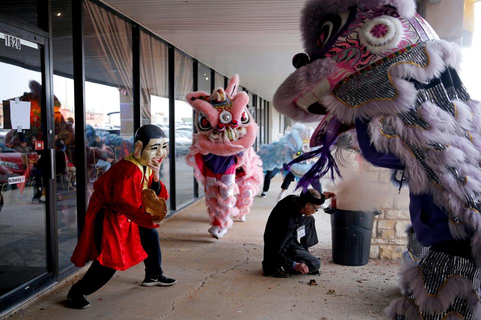 Members of the GQ Lion Dance from the Giac Quang Temple perform during a Lunar New Year Celebration at the Dove Event Center in Oklahoma City, Saturday, Jan. 14, 2023.