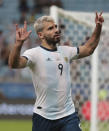 Argentina's Sergio Aguero celebrates after scoring his side's second goal against Qatar during a Copa America Group B soccer match at Arena do Gremio in Porto Alegre, Brazil, Sunday, June 23, 2019. (AP Photo/Silvia Izquierdo)