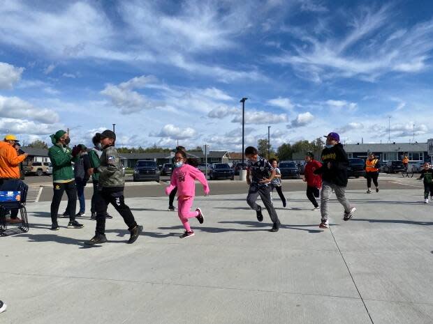 Students participate at Thursday's opening of the maskêkosihk Hub in Enoch Cree Nation, located west of Edmonton.  (Jered Stuffco/ CBC Edmonton - image credit)