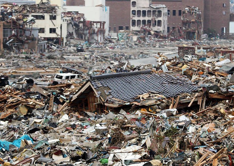 This picture taken on March 14, 2011 shows the tsunami-hit Onagawa town, in northeast Japan. Reactors at the Fukushima nuclear plant spewed radioactive contamination into the atmosphere, forcing the evacuation of tens of thousands of people