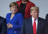 <p>German Chancellor Angela Merkel and President Trump attend the opening ceremony at the 2018 NATO Summit on July 11, 2018, in Brussels. (Photo: Sean Gallup/Getty Images) </p>