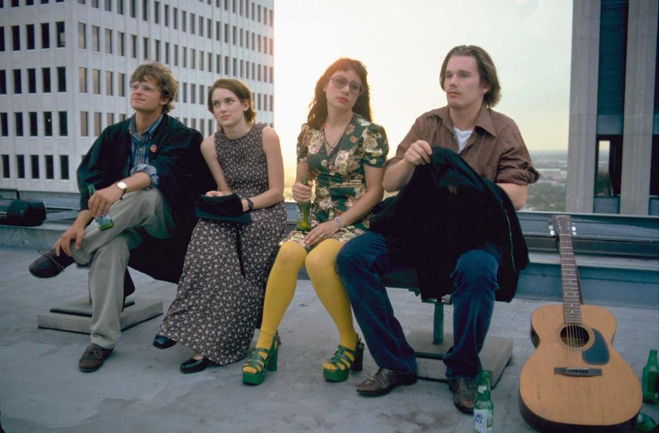 Steve Zahn, Winona Ryder, Janeane Garofalo, and Ethan Hawke sitting on a ledge