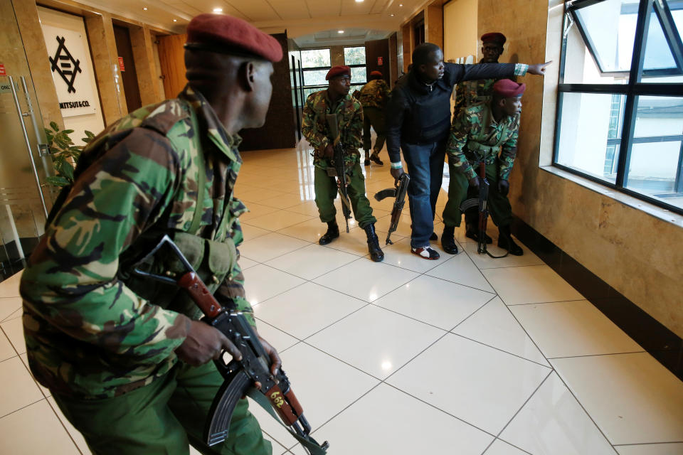 Members of security forces secure a building at the Dusit hotel compound, in Nairobi, Kenya, Jan.15, 2019. (Photo: Baz Ratner/Reuters)