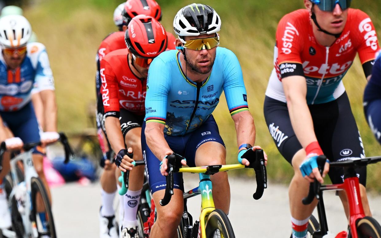 Mark Cavendish riding in the peloton on stage five