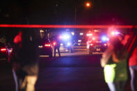 Police investigate after four people were killed and a fifth person was injured in a shooting at a Grantsville, Utah, home Friday, Jan. 17, 2020. The suspected shooter was taken into custody by Grantsville police, the Deseret News reported. Grantsville Mayor Brent Marshall said the victims and the shooter are all related, the newspaper reported. (Steve Griffin/The Deseret News via AP)