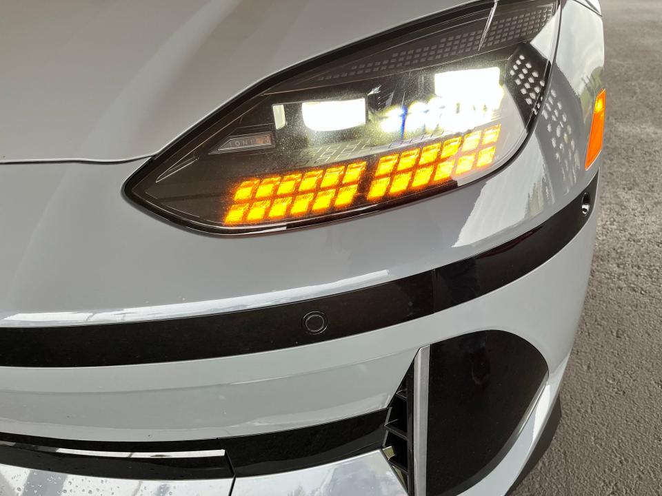 The 2023 Hyundai Ioniq 6 electric vehicle's LED exterior lights are designed to look like more than 700 individual pixels.