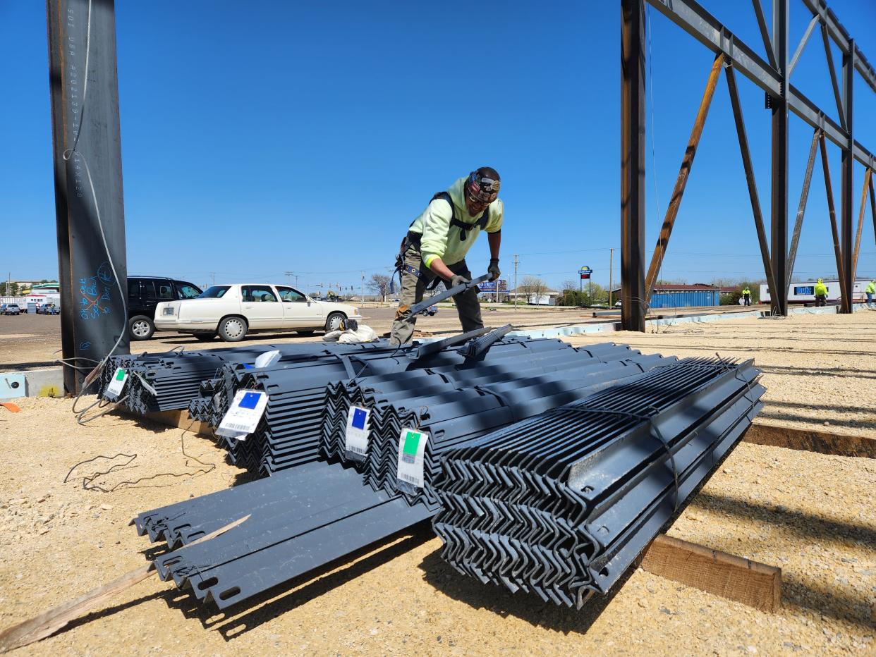 Iron worker Dean Markee of Darien, Wisconsin, prepares steel supports for installation Tuesday, April 18, 2023, at the future Hard Rock Casino Rockford, 7801 E. State St.