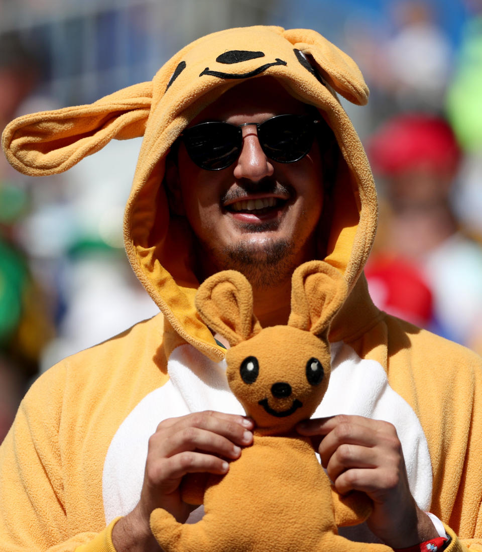 <p>Here’s looking at ‘roo: An Australia fan makes it clear where he’s from before their match against France. (Rex) </p>