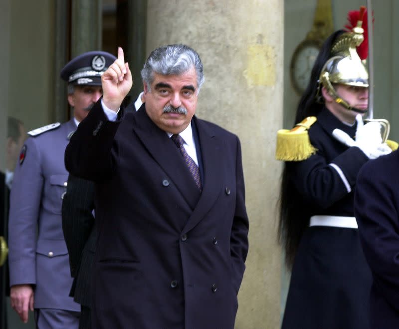 FILE PHOTO: Lebanese Prime Minister Rafik Hariri leaves the Elysee Palace following a meeting with French President Jacques Chirac in Paris