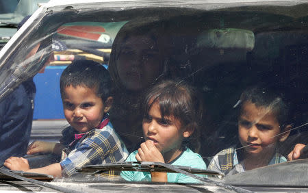 Syrian refugees prepare to return to Syria from the Lebanese border town of Arsal, Lebanon June 28, 2018. REUTERS/Mohamed Azakir