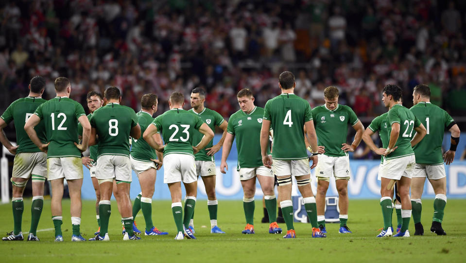 Ireland's players react after their 19-12 loss to Japan during the Rugby World Cup Pool A game at Shizuoka Stadium Ecopa between Japan and Ireland in Shizuoka, Japan, Saturday, Sept. 28, 2019. (Naoya Osato/Kyodo News via AP)