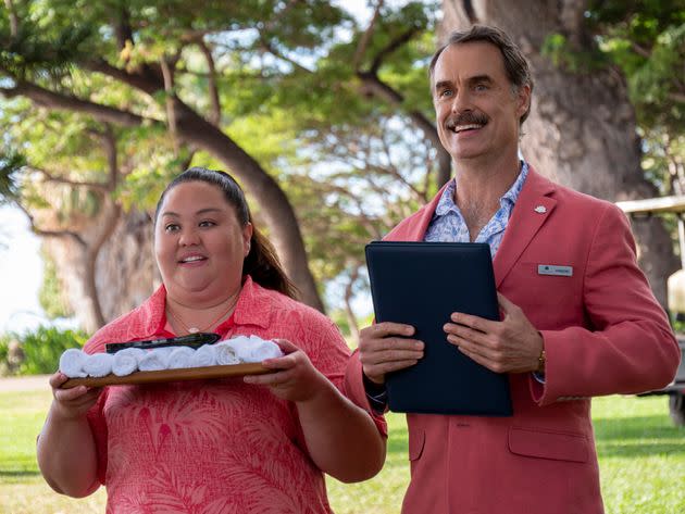 Lani (Jolene Purdy) and Armond (Murray Bartlett) greet new guests at the White Lotus on HBO's 