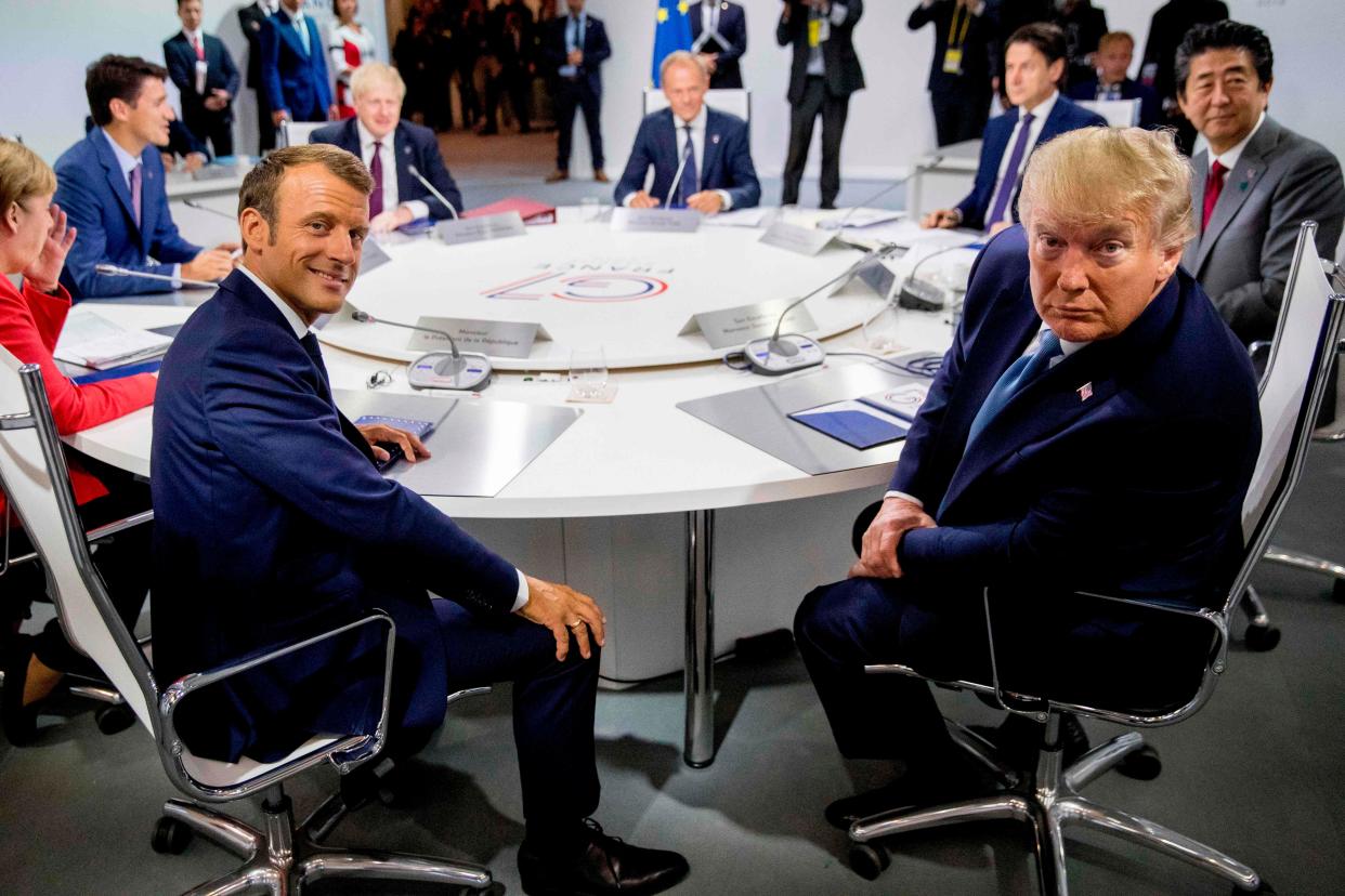 French President Emmanuel Macron 
and President Donald Trump attend  a working session on 