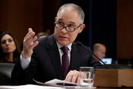 FILE PHOTO -- Oklahoma Attorney General Scott Pruitt testifies before a Senate Environment and Public Works Committee confirmation hearing on his nomination to be administrator of the Environmental Protection Agency in Washington, U.S., January 18, 2017. REUTERS/Joshua Roberts/File Photo