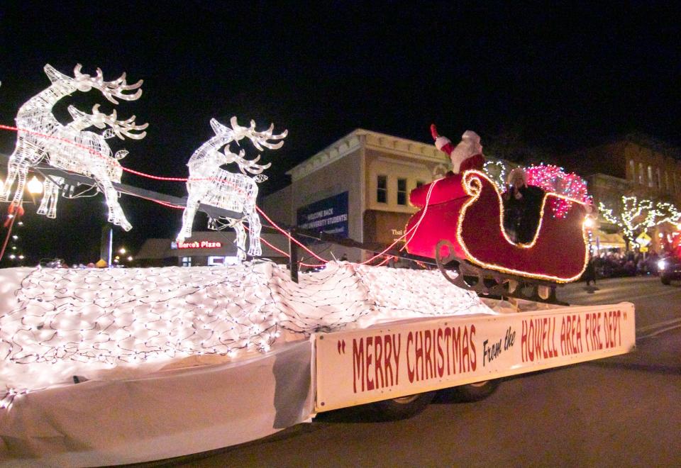 Santa's float parades down Grand River during Howell's Fantasy of Lights Parade in 2022.