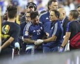Jun 21, 2016; Houston, TX, USA; Argentina forward Ezequiel Lavezzi (22) is helped onto a stretcher after falling over the wall during the second half against the United States in the semifinals of the 2016 Copa America Centenario soccer tournament at NRG Stadium. Argentina won 4-0. Troy Taormina-USA TODAY Sports